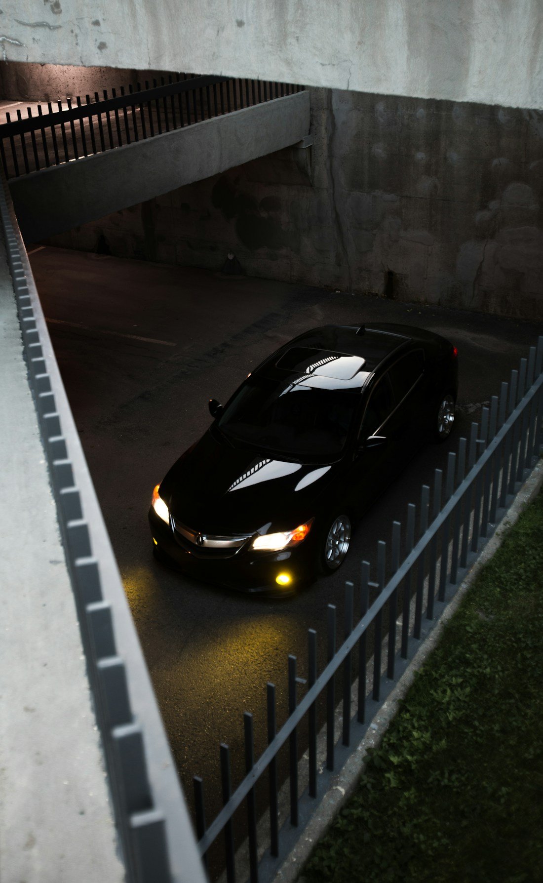 Black sedan parked outside, illustrative automotive photography